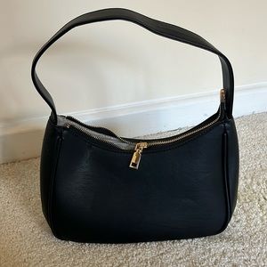 Never used black Amazon purse with gold accent zipper